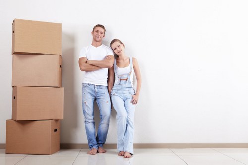 Furniture pick-up service in a Greenwich home with bulky items ready for removal