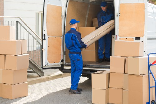 Man with van service loading items in Greenwich