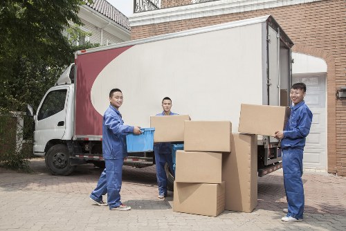 Business relocation planning in Greenwich with office equipment and boxes