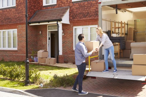Removal team handling a Greenwich home move near period properties