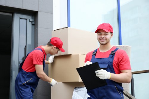 Loading household items into a removal truck in Greenwich