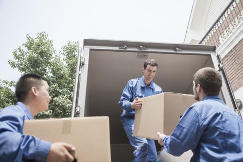 Moving van service operating in Greenwich near local residential streets