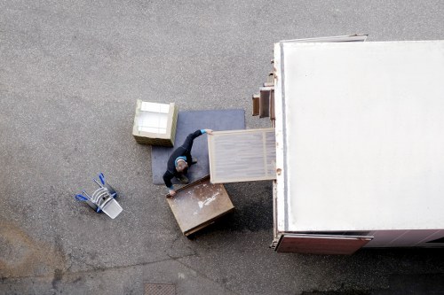 Furniture and boxes being loaded into a moving van in Greenwich