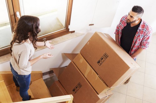 Furniture and boxes arranged inside a hire removal truck