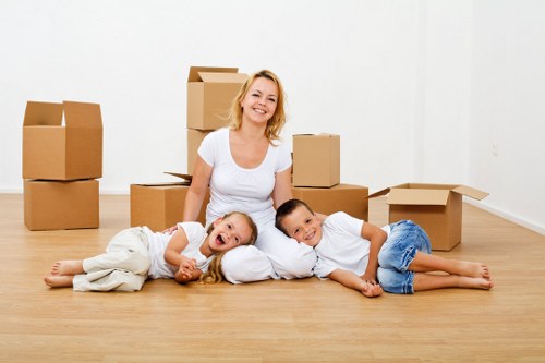 Local movers handling furniture in Greenwich street