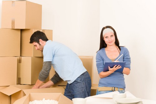 Organised desks and boxes prepared for an office relocation in Greenwich